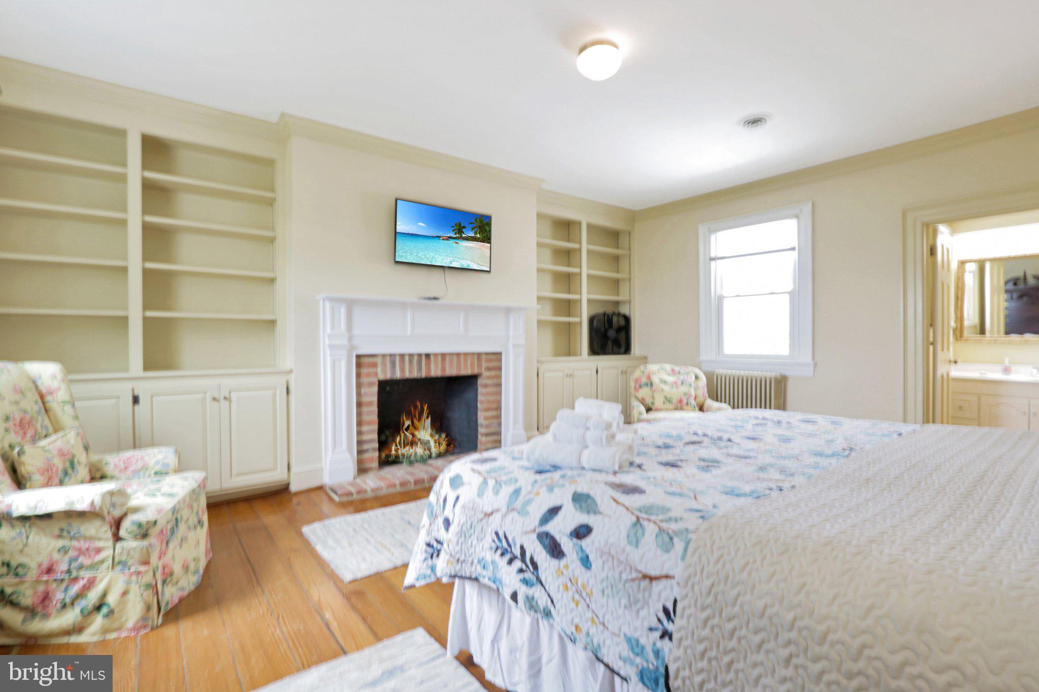 2598 Cherrystone Road Cape Charles, VA 23310 - Photo 26 of 47 Cozy retreat with a warm fireplace.