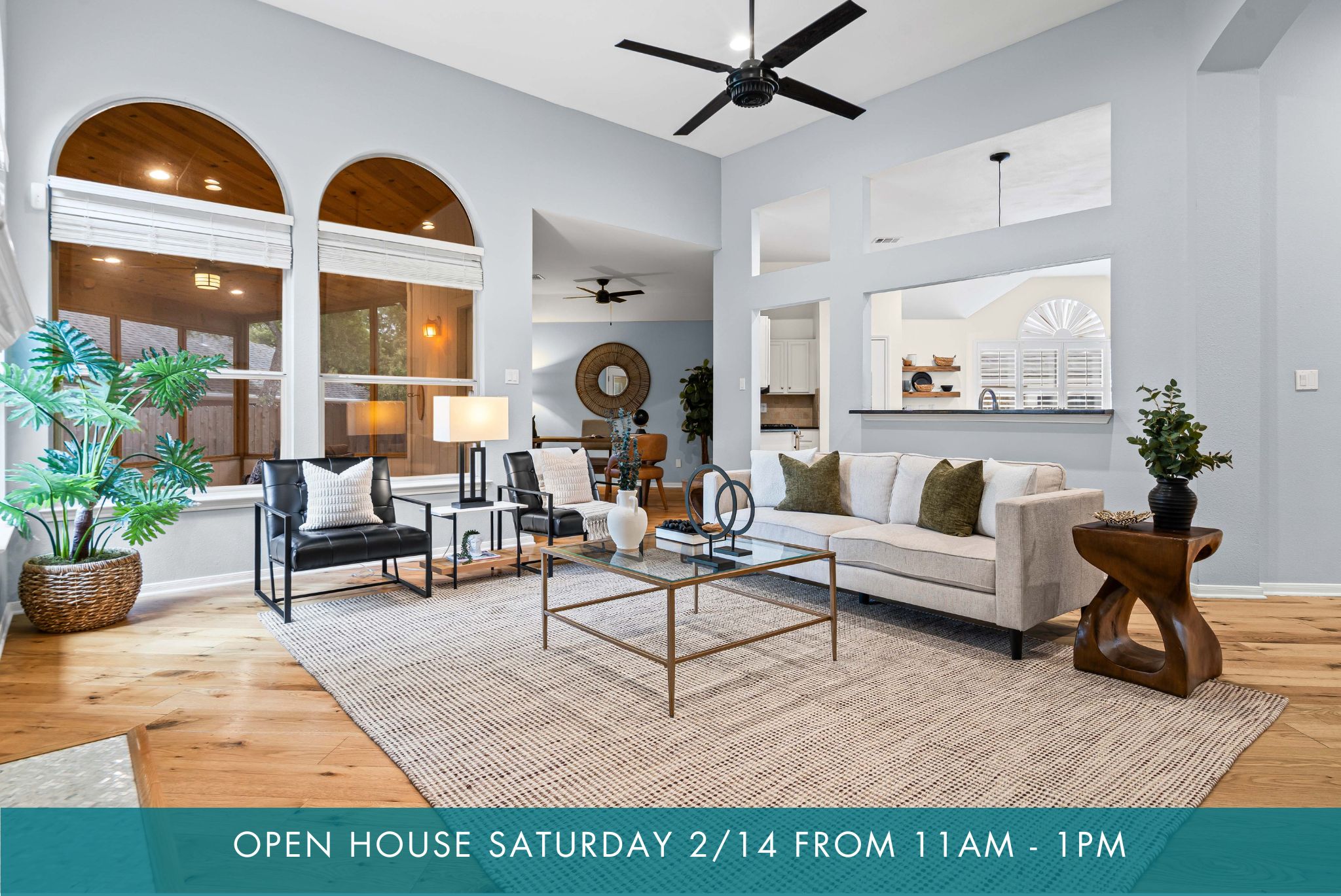 9317 Colberg Drive Austin, TX 78749 - Photo 1 of 1 a living room with furniture potted plant and a large window