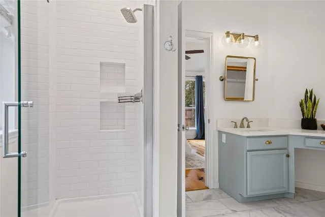 a bath tub sitting next to a window