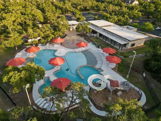 a picture of a bathroom with a shower