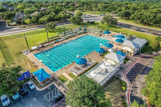 an aerial view of residential house with outdoor space