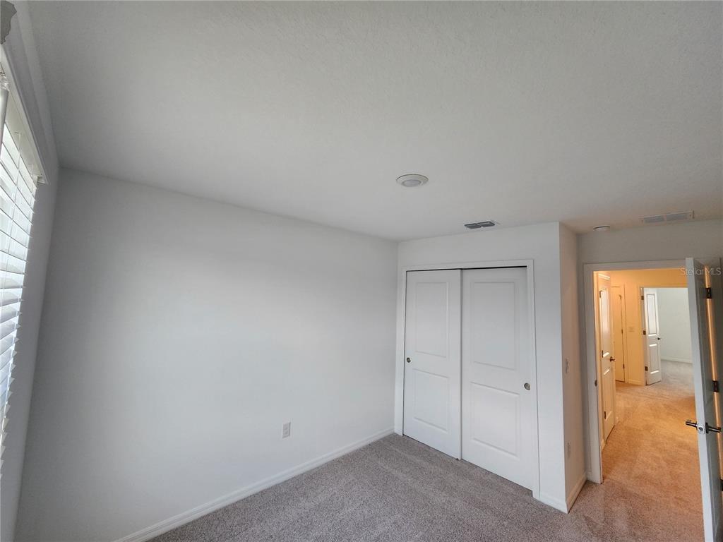2620 Penguin Boulevard Davenport, FL 33837 - Photo 11 of 14 a view of an empty room