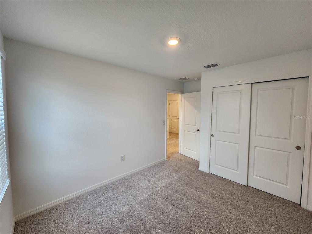 2620 Penguin Boulevard Davenport, FL 33837 - Photo 10 of 14 a view of an empty room