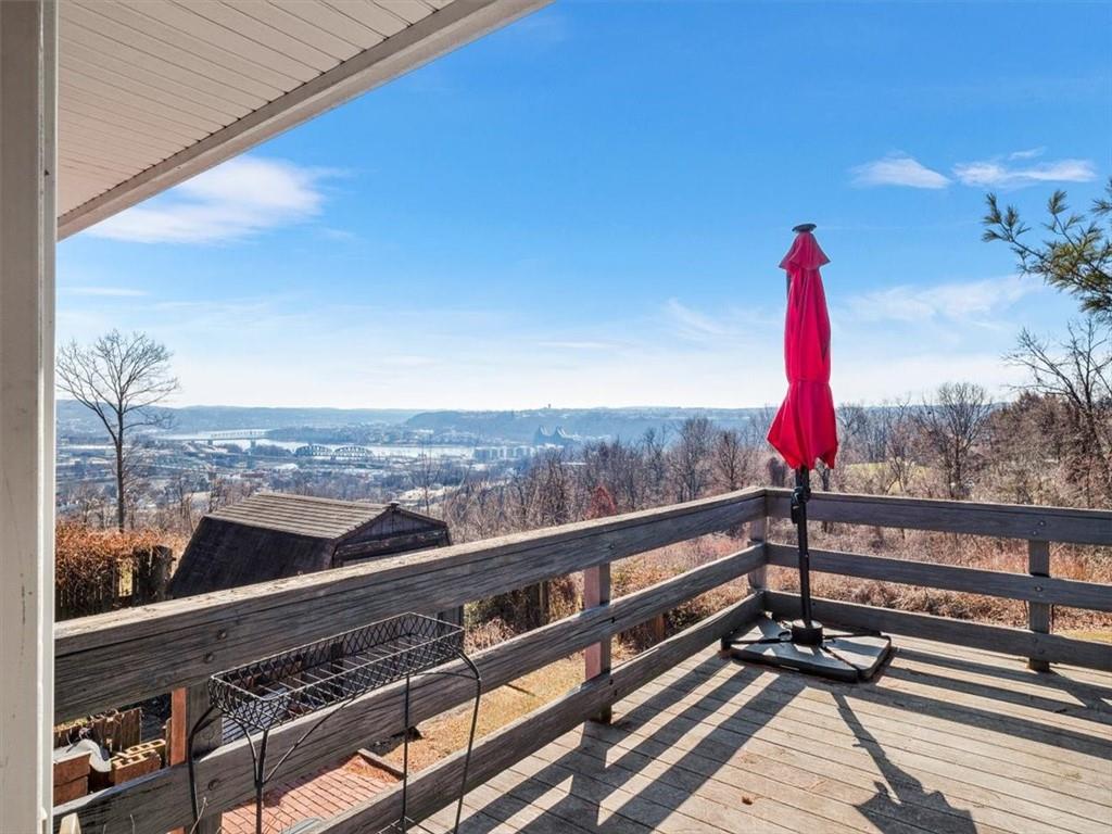 201 Western Avenue Beaver, PA 15009 - Photo 24 of 29 a view of a balcony with wooden floor and iron stairs