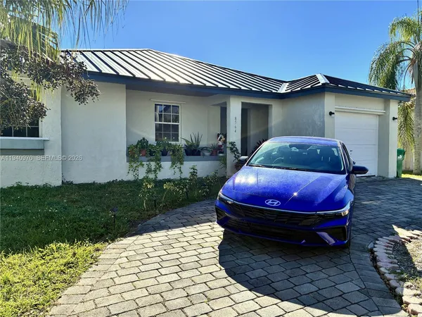 a house view with a garden space