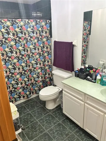 a view of a backyard with a small pool