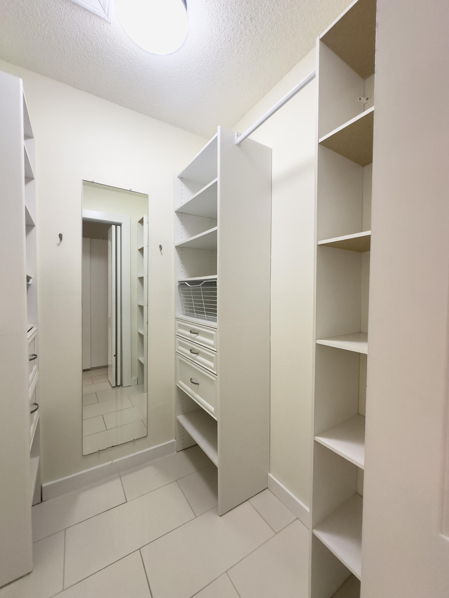 13741 Flora Place, Unit B Delray Beach, FL 33484 - Photo 17 of 34 Primary Bedroom Closet