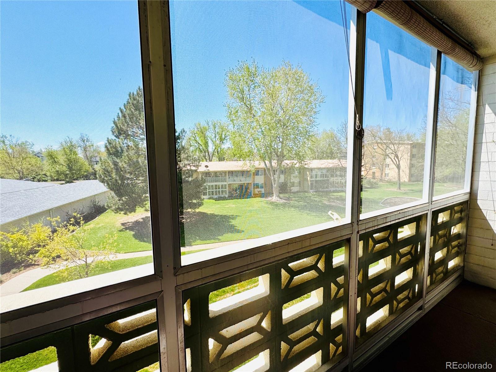 755 South Alton Way, Unit 12C Denver, CO 80247 - Photo 12 of 12 a view of city from a window