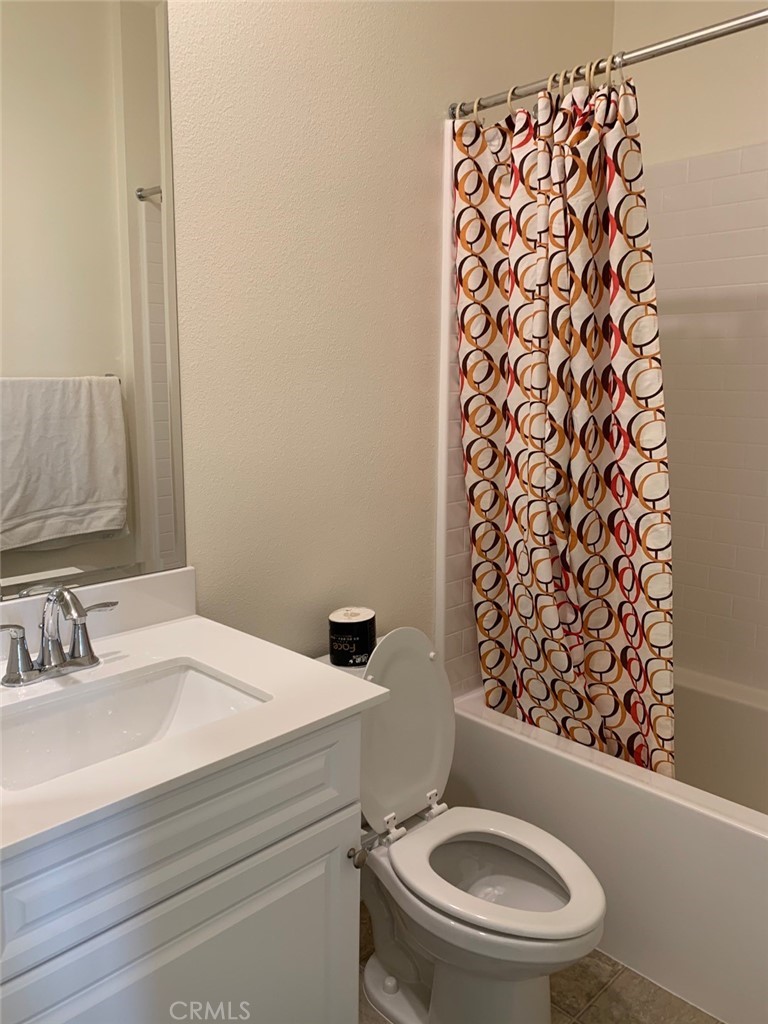 170 Unity Irvine, CA 92614 - Photo 6 of 10 a white toilet sitting next to a bathroom sink