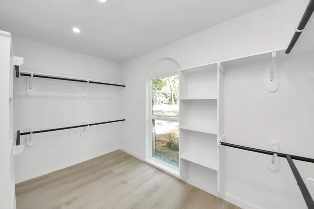 a view of an empty walk in closet