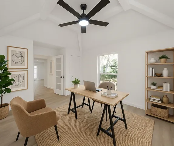 a workspace with furniture and a window