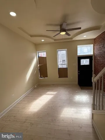 a view of an empty room and window
