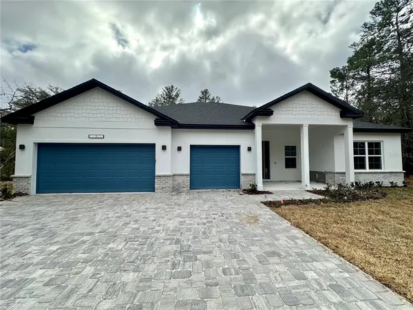 a house with yard and a space