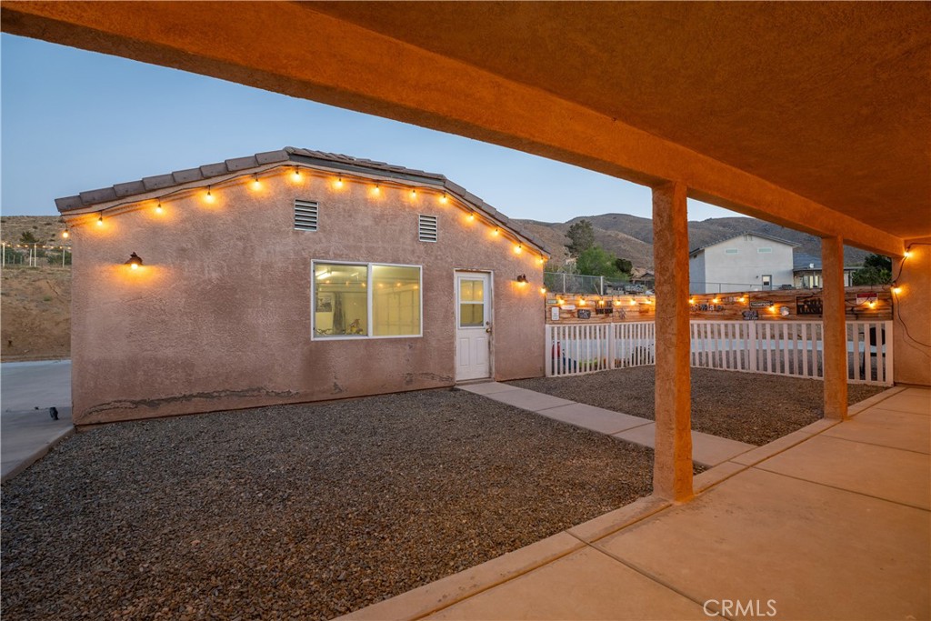 23053 Roundup Way Apple Valley, CA 92308 - Photo 36 of 46 a backyard view of a house