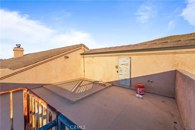 a backyard view with hardwood wall