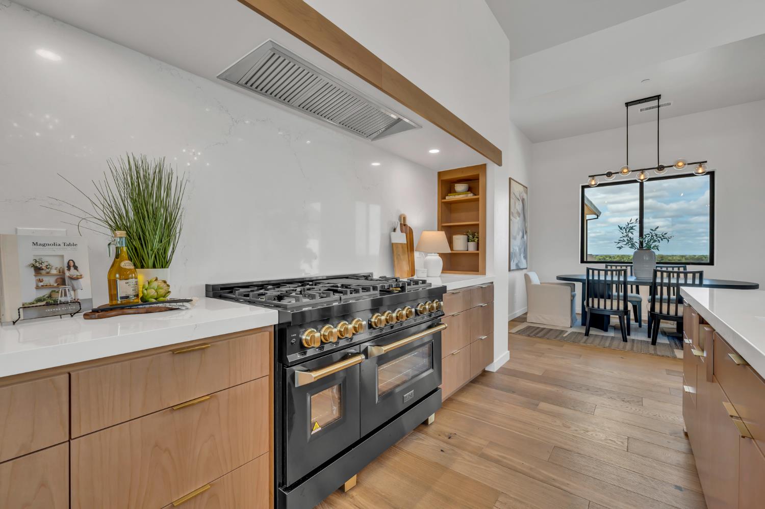 331 Big Ben Road Lincoln, CA 95648 - Photo 17 of 79 a kitchen with a stove and a wooden floors