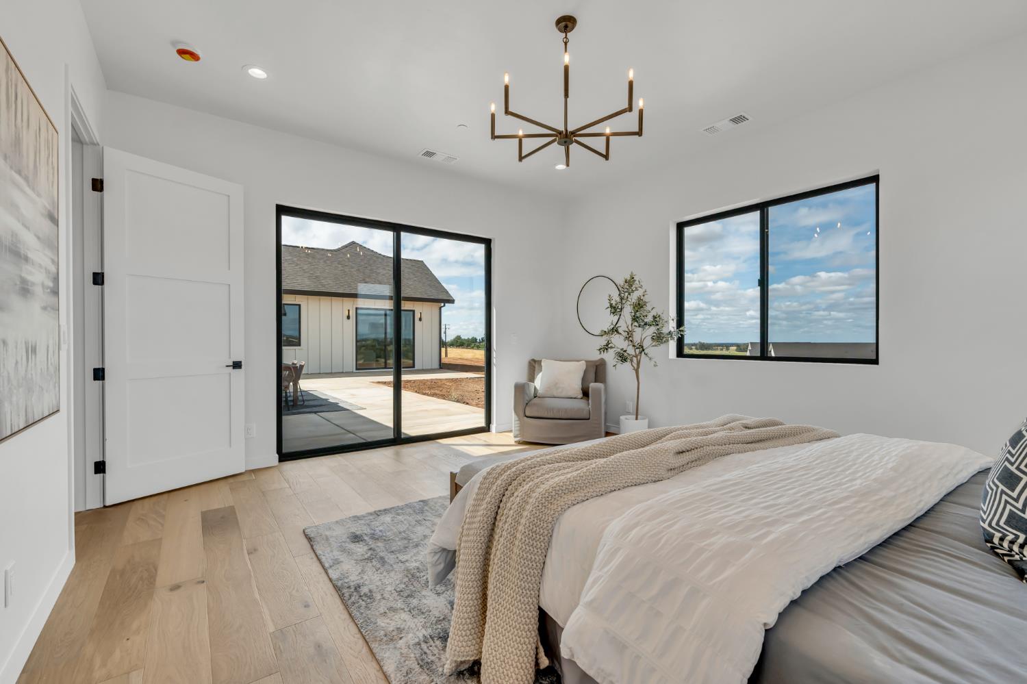 331 Big Ben Road Lincoln, CA 95648 - Photo 33 of 79 a bedroom with a large bed and a window