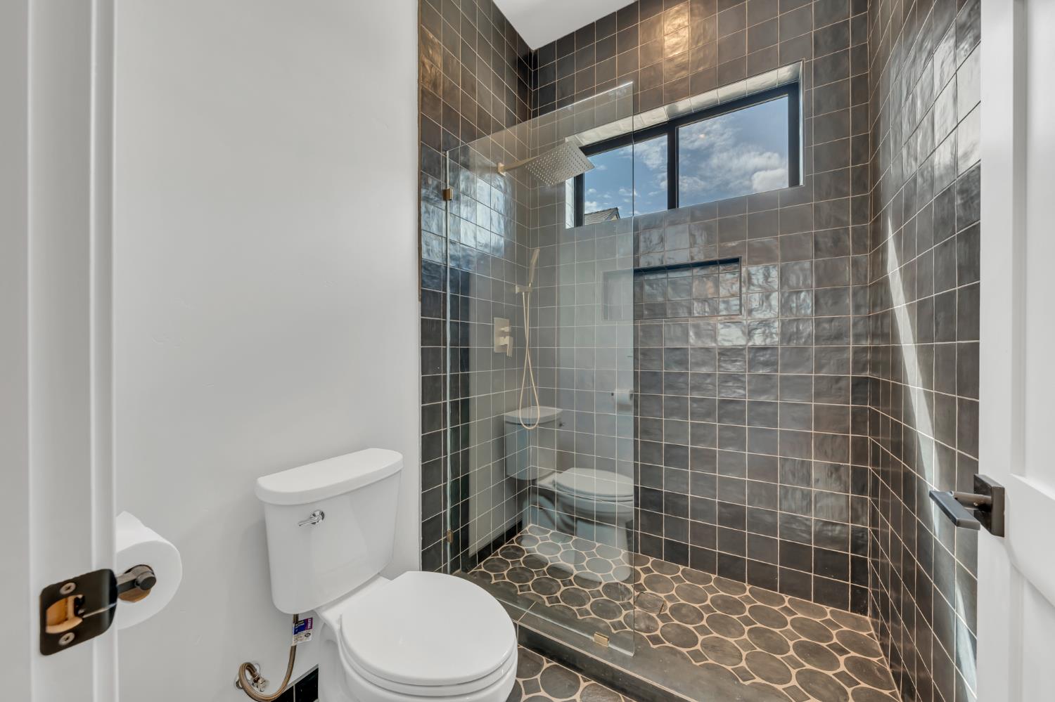 331 Big Ben Road Lincoln, CA 95648 - Photo 47 of 79 a white toilet sitting next to a bathroom sink