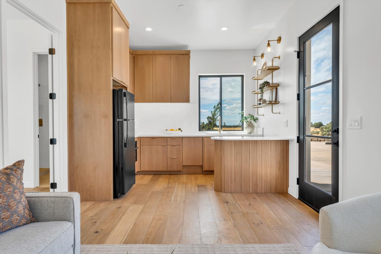 331 Big Ben Road Lincoln, CA 95648 - Photo 58 of 79 a kitchen with stainless steel appliances kitchen island granite countertop a refrigerator and microwave