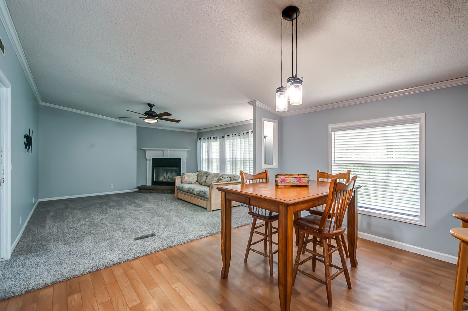 105 Fisher Road Dickson, TN 37055 - Photo 12 of 43 a view of a dining room with furniture window and wooden floor