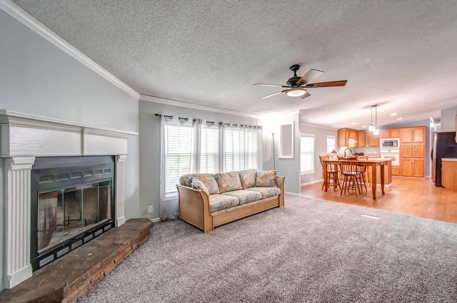 105 Fisher Road Dickson, TN 37055 - Photo 15 of 43 a living room with furniture and a fireplace