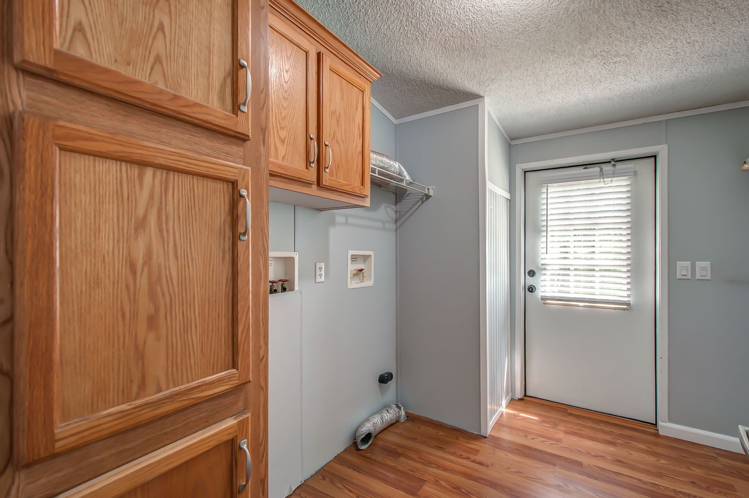 105 Fisher Road Dickson, TN 37055 - Photo 25 of 43 a view of an empty room with wooden floor and a window