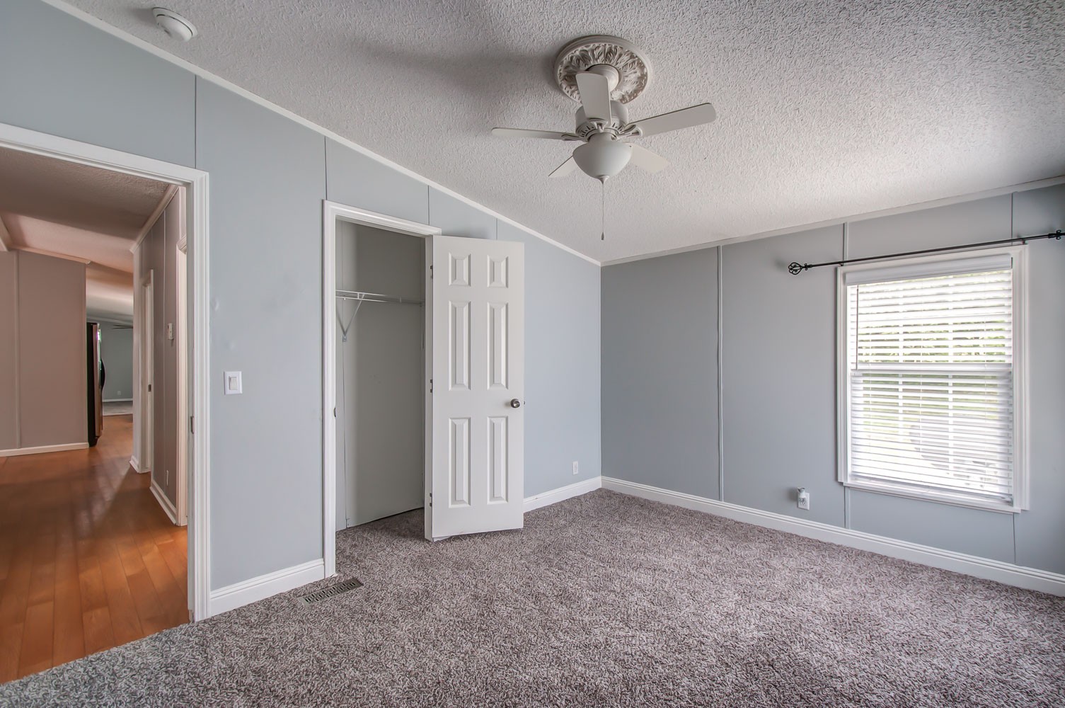 105 Fisher Road Dickson, TN 37055 - Photo 33 of 43 a view of an empty room with wooden floor and a window