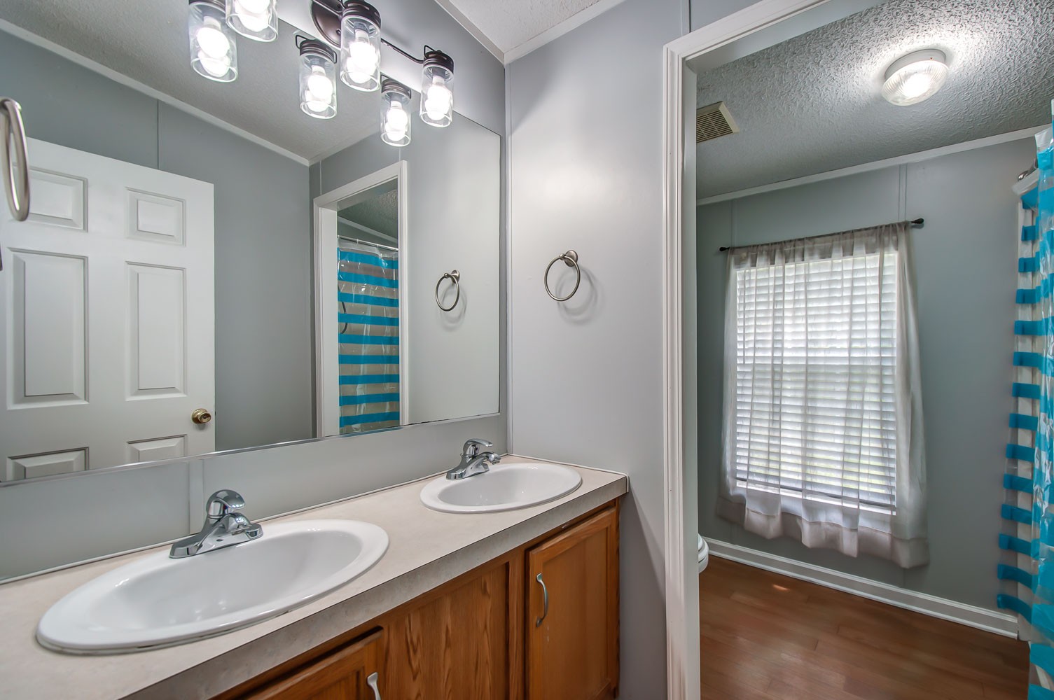105 Fisher Road Dickson, TN 37055 - Photo 34 of 43 a bathroom with a sink double vanity and a mirror