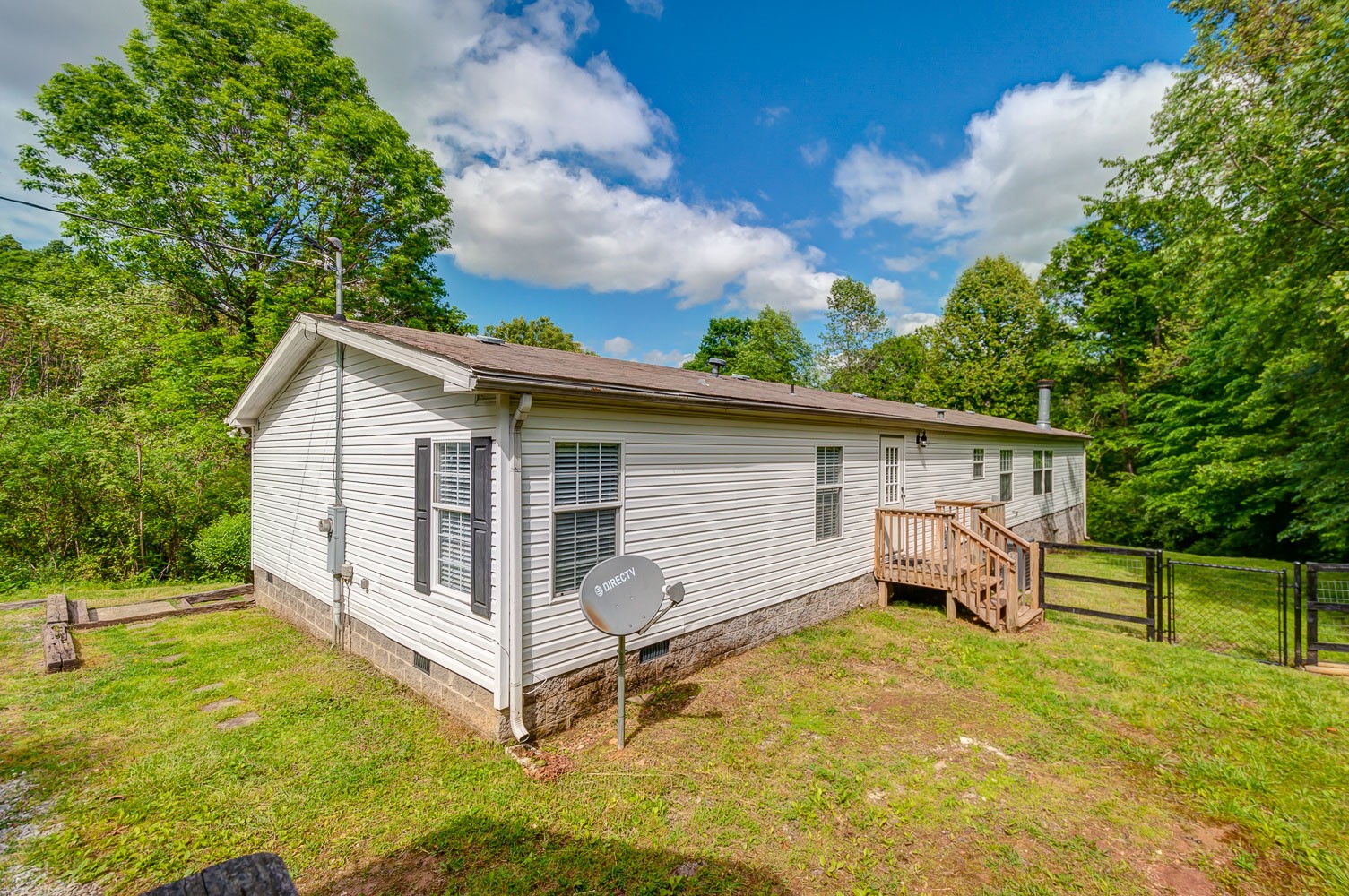 105 Fisher Road Dickson, TN 37055 - Photo 37 of 43 a view of a backyard with a large tree