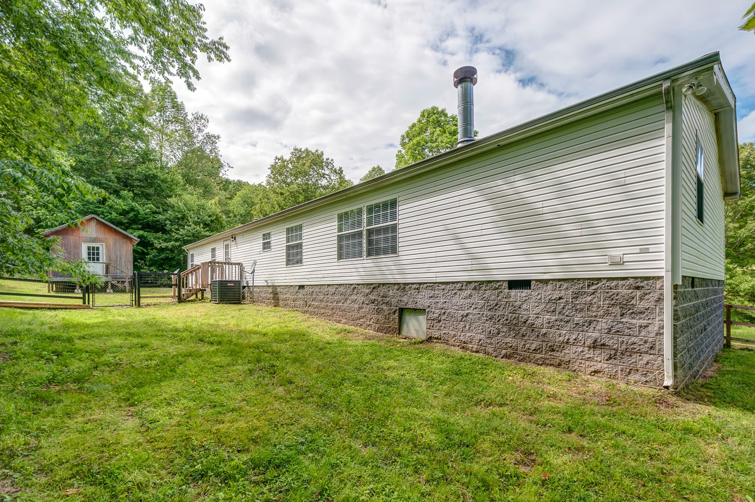 105 Fisher Road Dickson, TN 37055 - Photo 38 of 43 a front view of house with yard and green space
