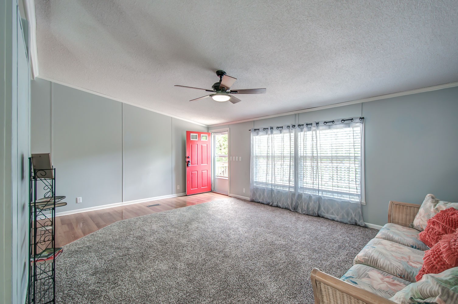 105 Fisher Road Dickson, TN 37055 - Photo 7 of 43 a living room with a ceiling fan and a window