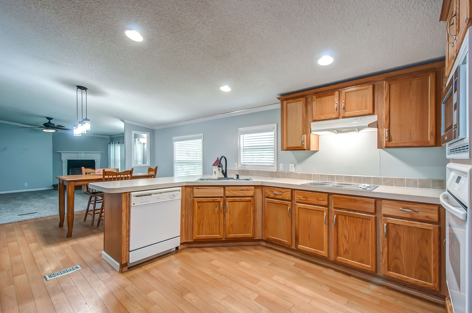 105 Fisher Road Dickson, TN 37055 - Photo 9 of 43 a large kitchen with stainless steel appliances granite countertop a sink and cabinets