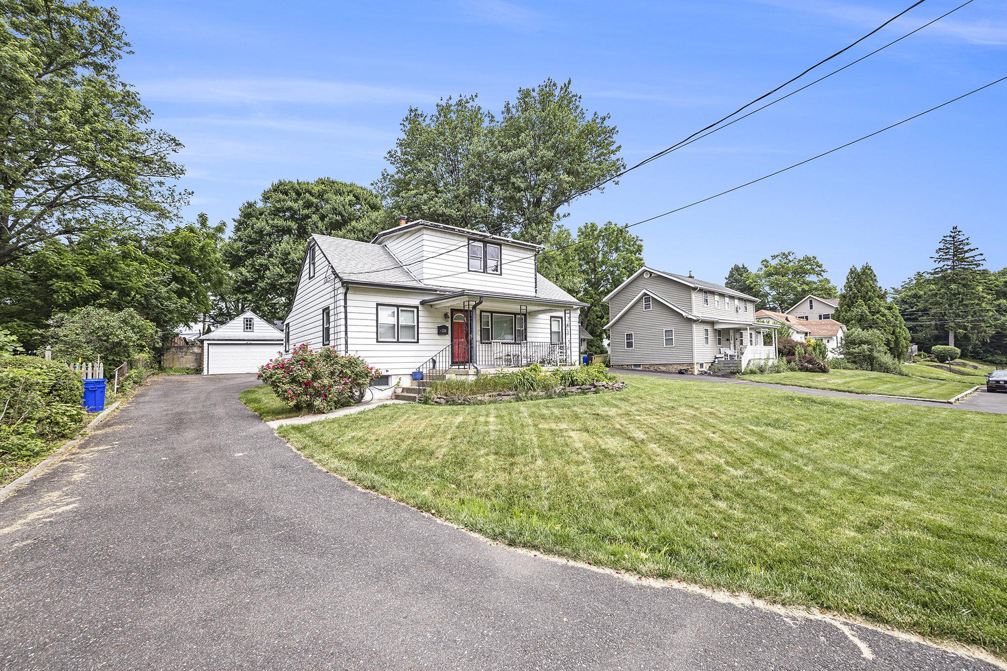 524 Continental Road Hatboro, PA 19040 - Photo 2 of 23 Charming home with lush green surroundings.