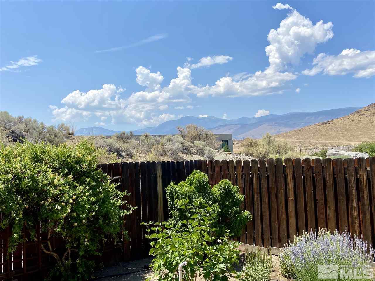 1486 Amston Road Reno, NV 89511 - Photo 15 of 18 a view of a yard with flower plants