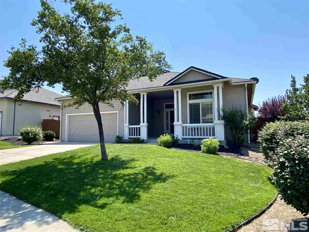 1486 Amston Road Reno, NV 89511 - Photo 2 of 18 a front view of a house with a garden