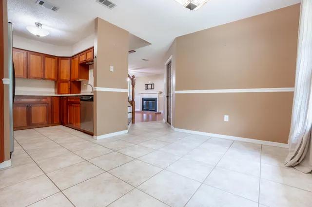 a view of a kitchen with a sink