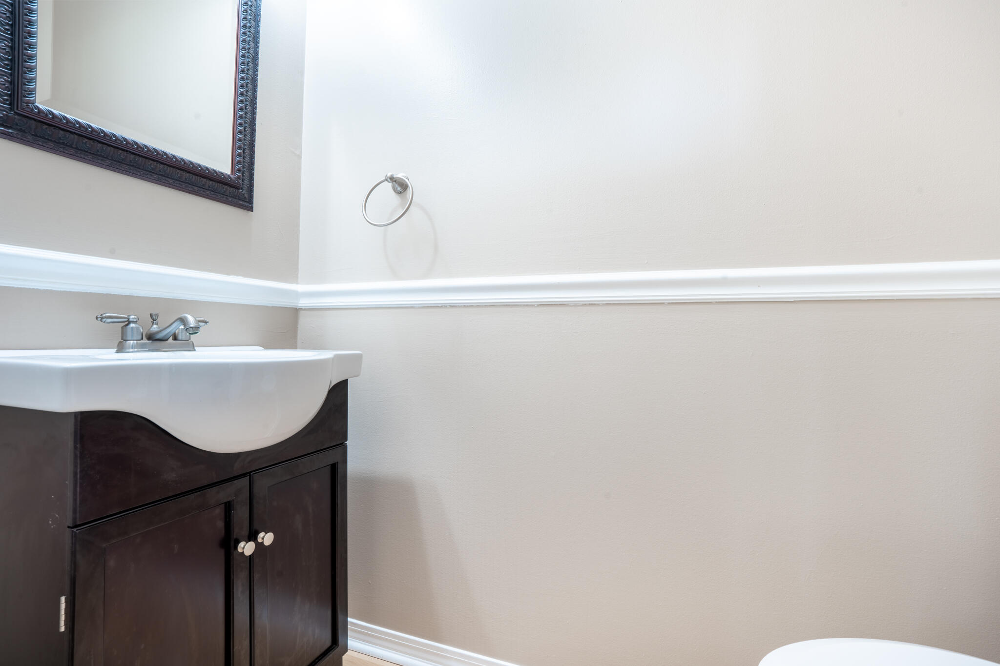 2786 Willow Bend Court Crestview, FL 32539 - Photo 17 of 32 a bathroom with a sink vanity and a toilet