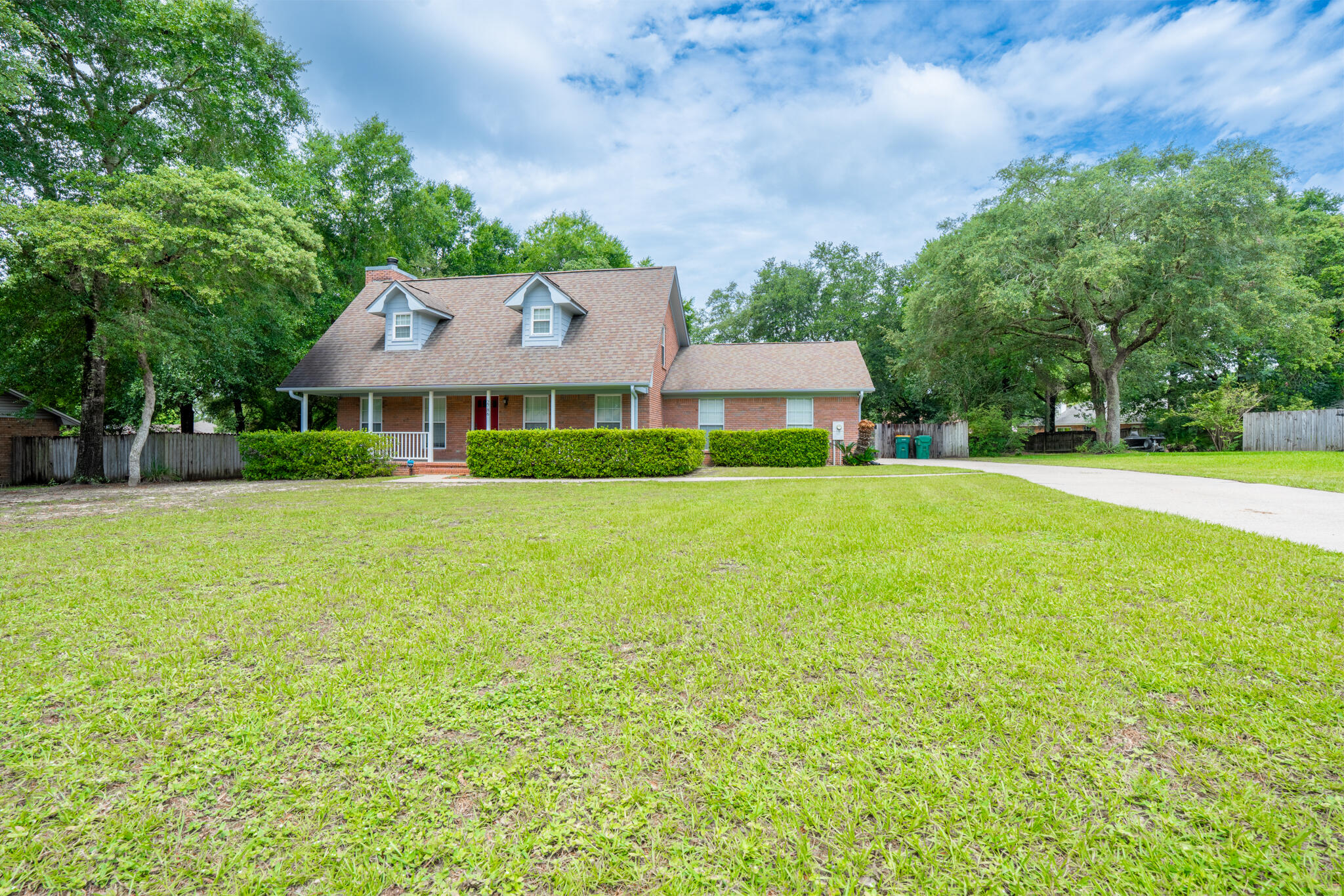 2786 Willow Bend Court Crestview, FL 32539 - Photo 3 of 32 a front view of a house with a yard