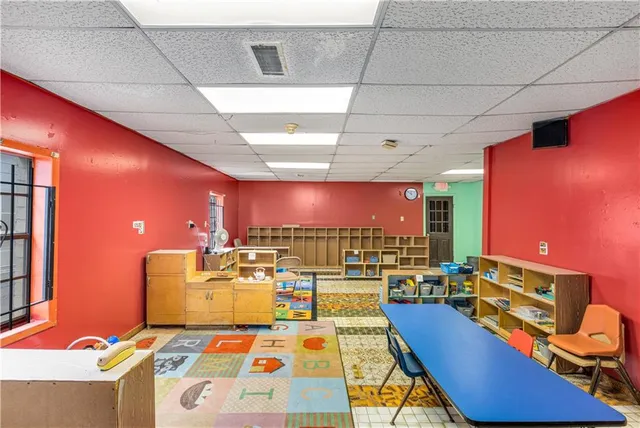 a large room with furniture