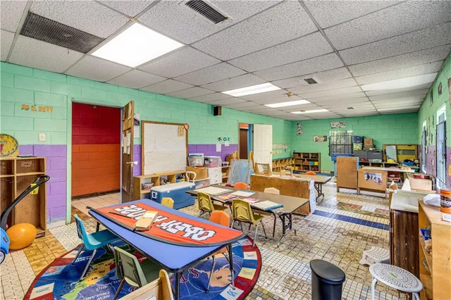 a outdoor space with lots of furniture and rug