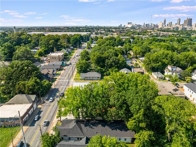 an aerial view of a city with lots of residential buildings