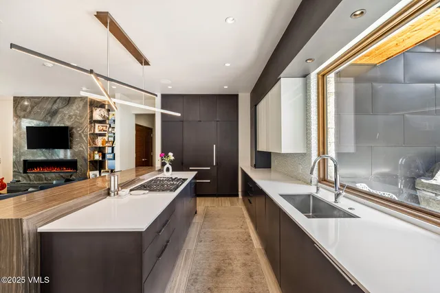 a living room with furniture fireplace and a flat screen tv