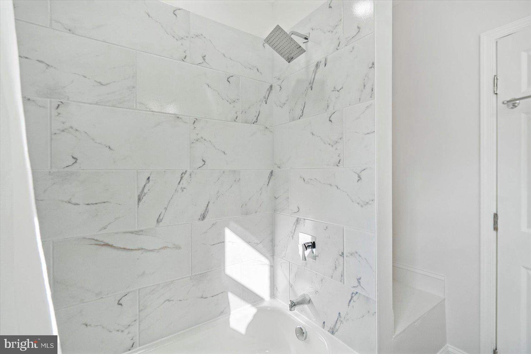 5515 Hillen Road Baltimore, MD 21239 - Photo 36 of 41 a bathroom with a shower