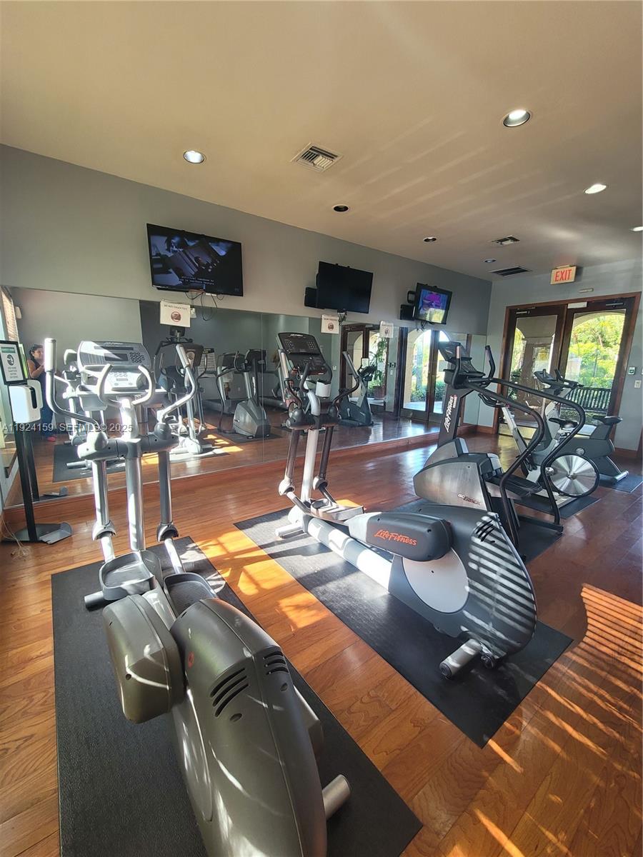 2133 Renaissance Boulevard, Unit 306 Miramar, FL 33025 - Photo 25 of 32 a view of a room with gym equipment