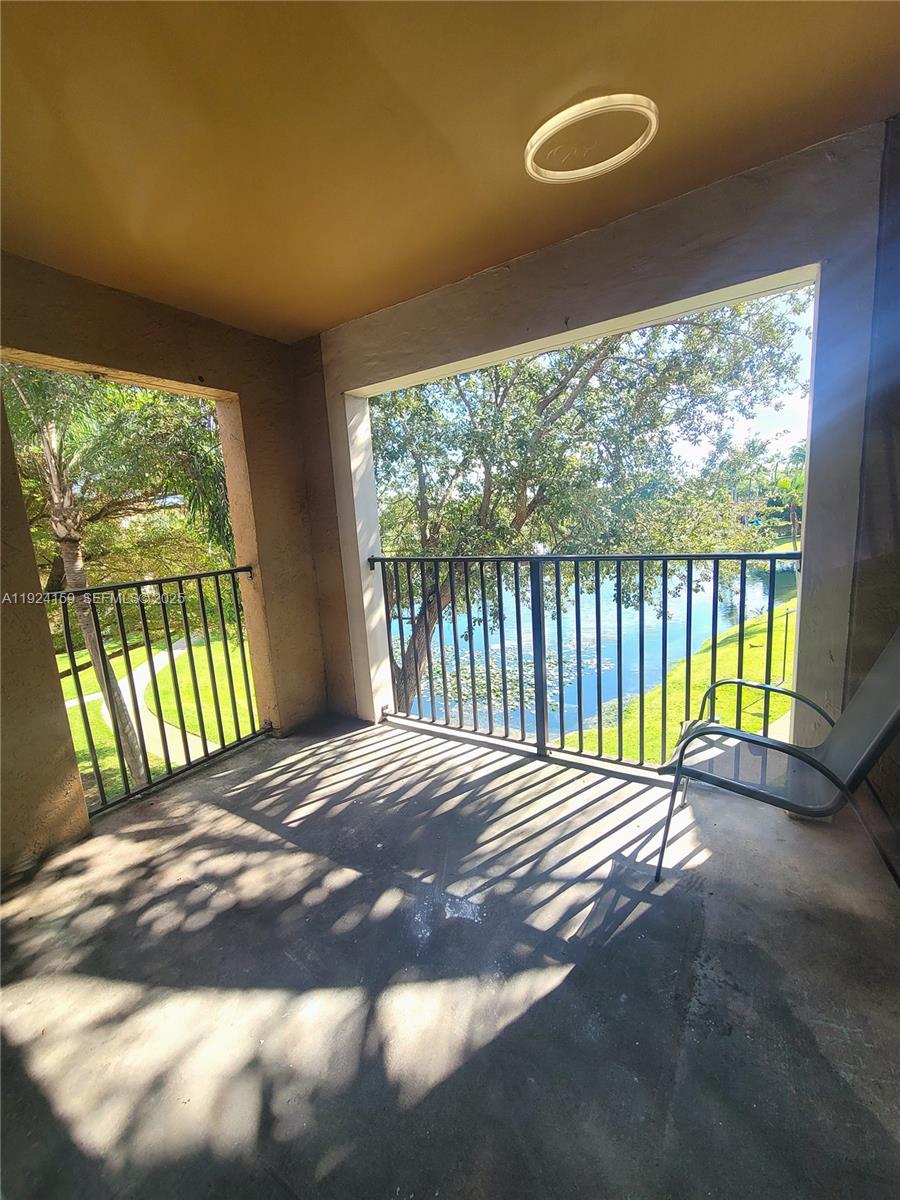 2133 Renaissance Boulevard, Unit 306 Miramar, FL 33025 - Photo 5 of 32 a view of a room with a large window