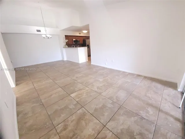 a view of a livingroom with a staircase