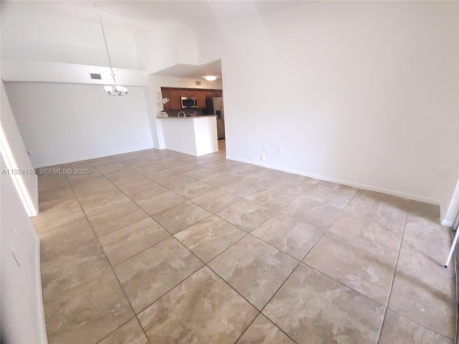 2133 Renaissance Boulevard, Unit 306 Miramar, FL 33025 - Photo 9 of 32 a view of a storage & utility room