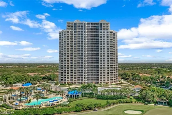 a view of a city with tall buildings