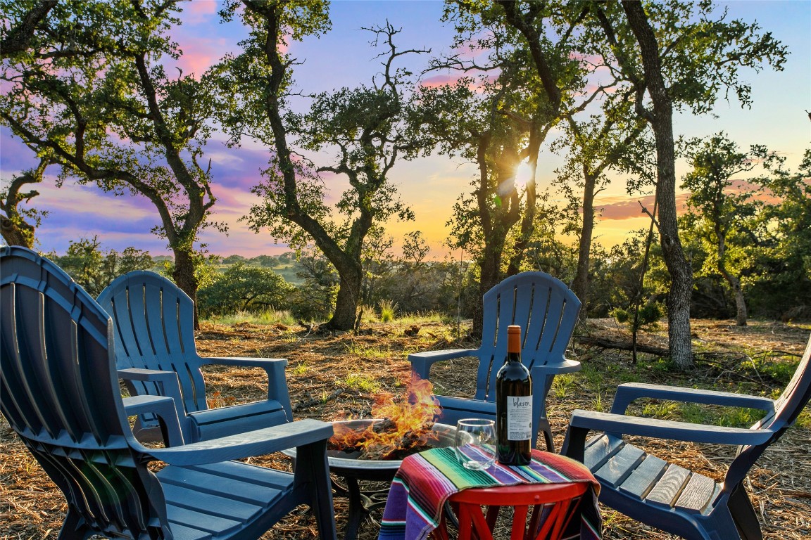 Lot 9 Stanton Road Johnson City, TX 78636 - Photo 8 of 14 a view of a chairs and table in patio