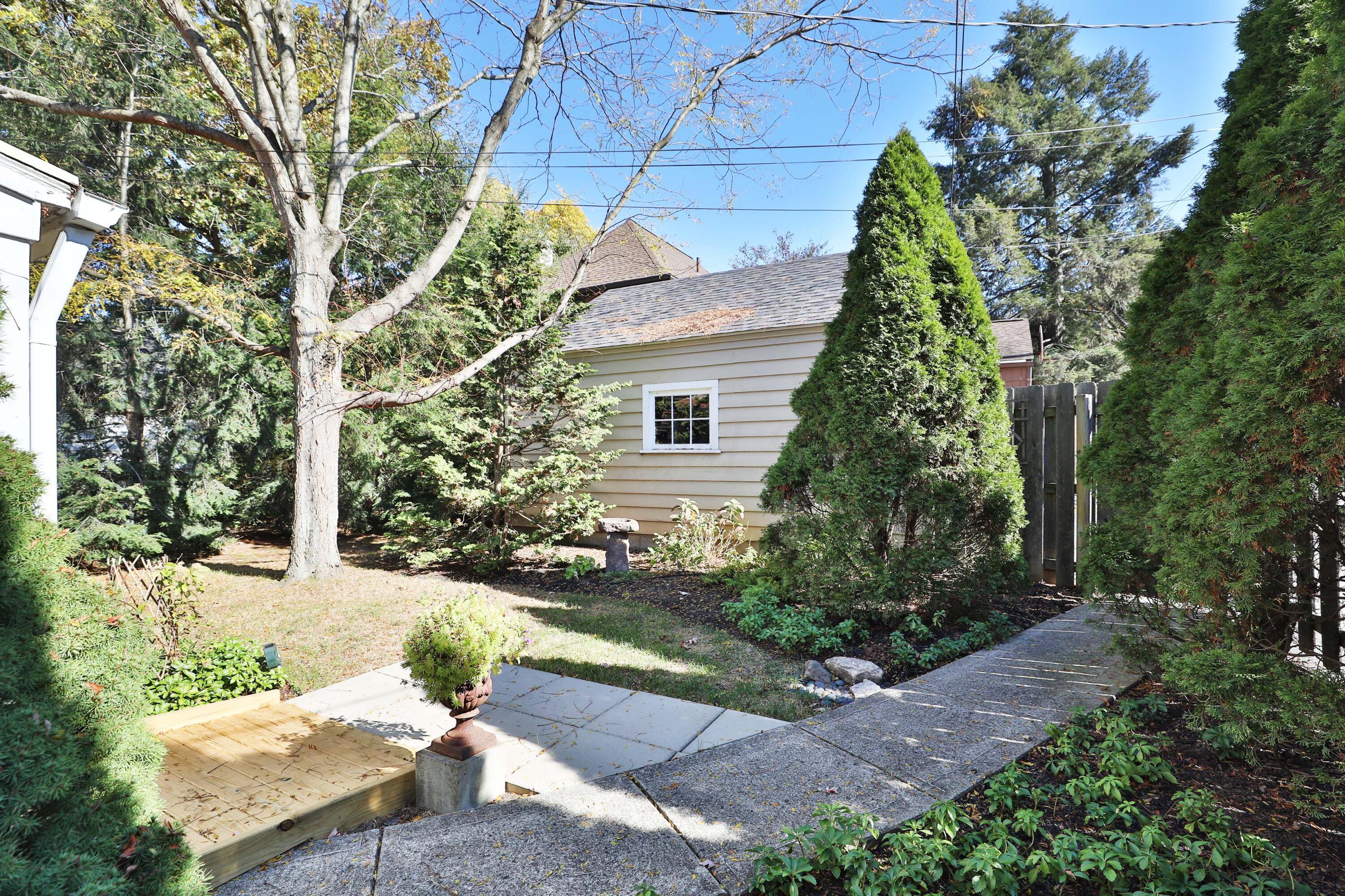 4436 Zeller Road Columbus, OH 43214 - Photo 41 of 42 Back yard-New wheel chair ramp at back door conveys